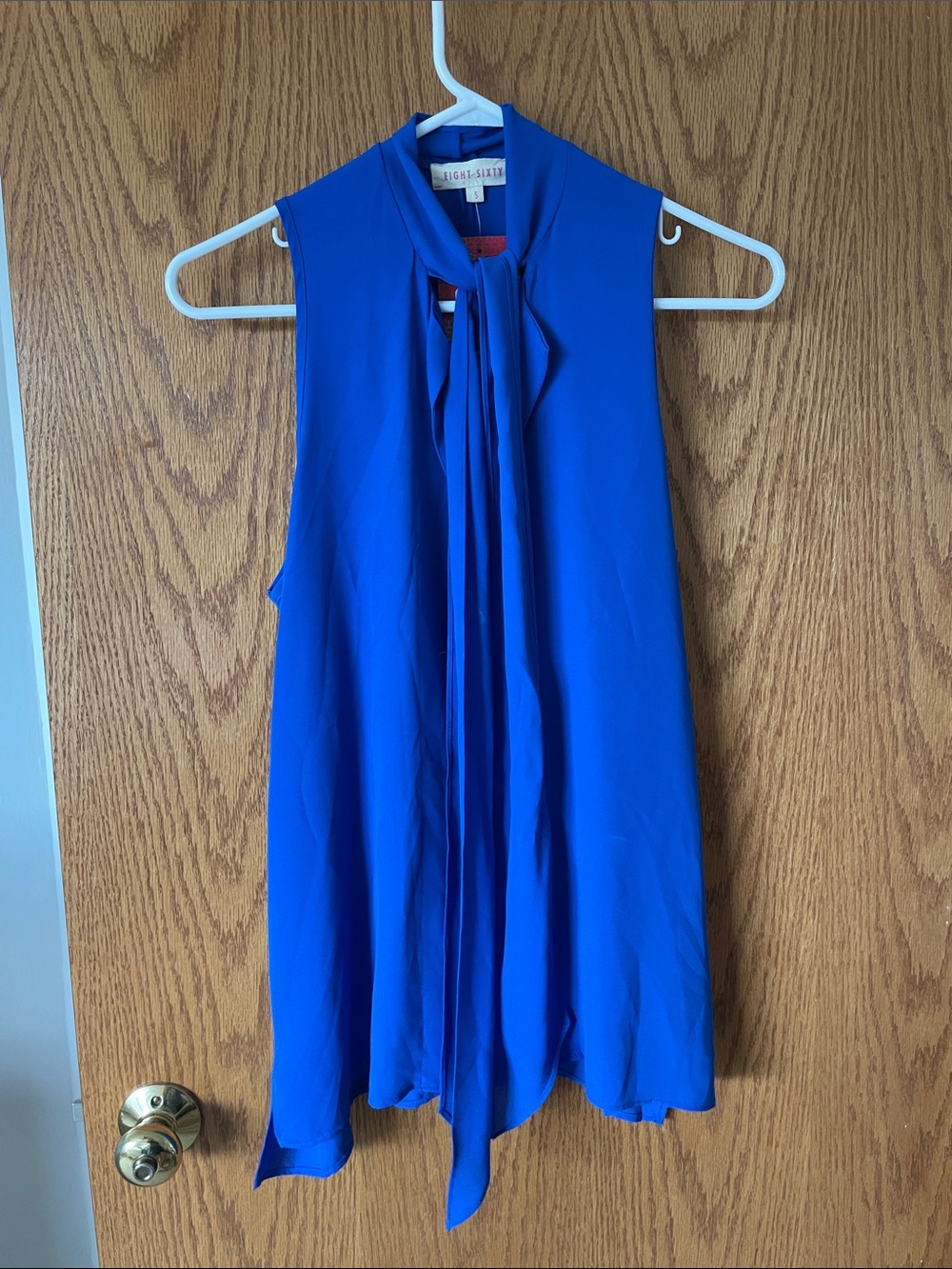 Tie Neck Sleeveless Blouse